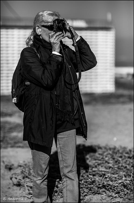 Ruth photographing on beach