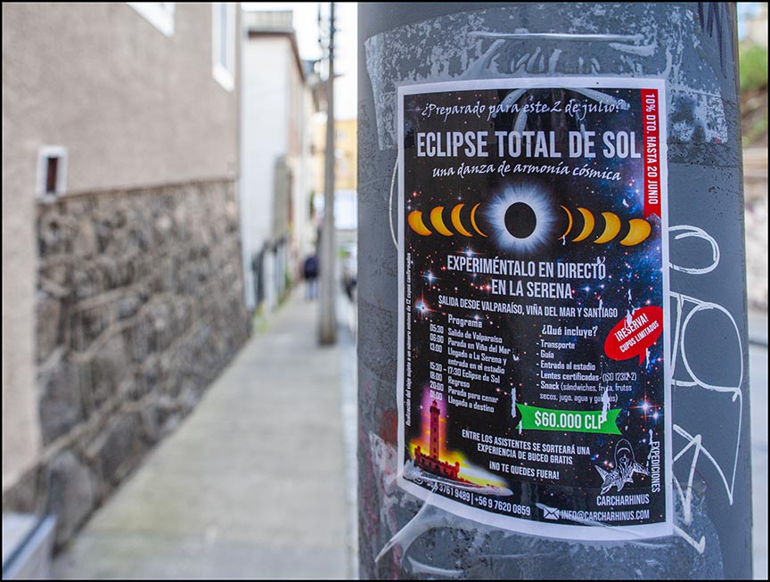 eclipse flyer advertising the eclipse on lampost in Valparaiso