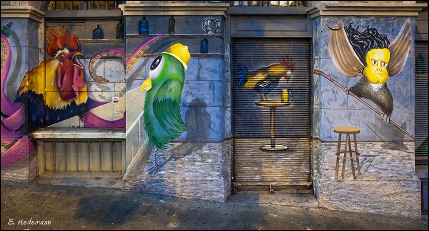 mural of roosters and birds