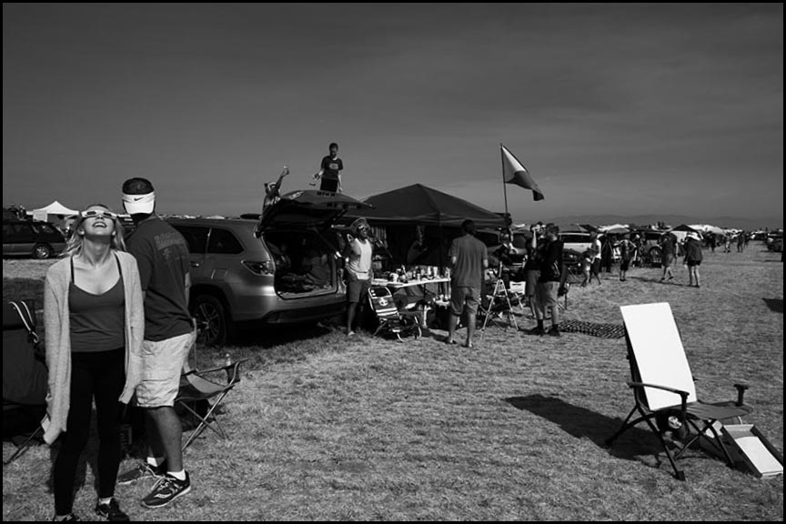 woman viewing partial eclipse